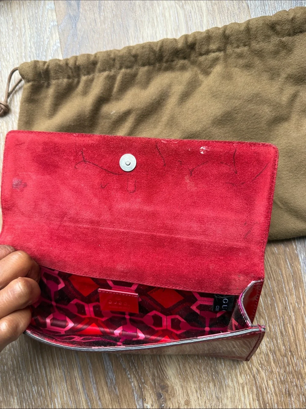 Gucci Red Patent Leather Wallet-Style Phone Case with Buckle Accent